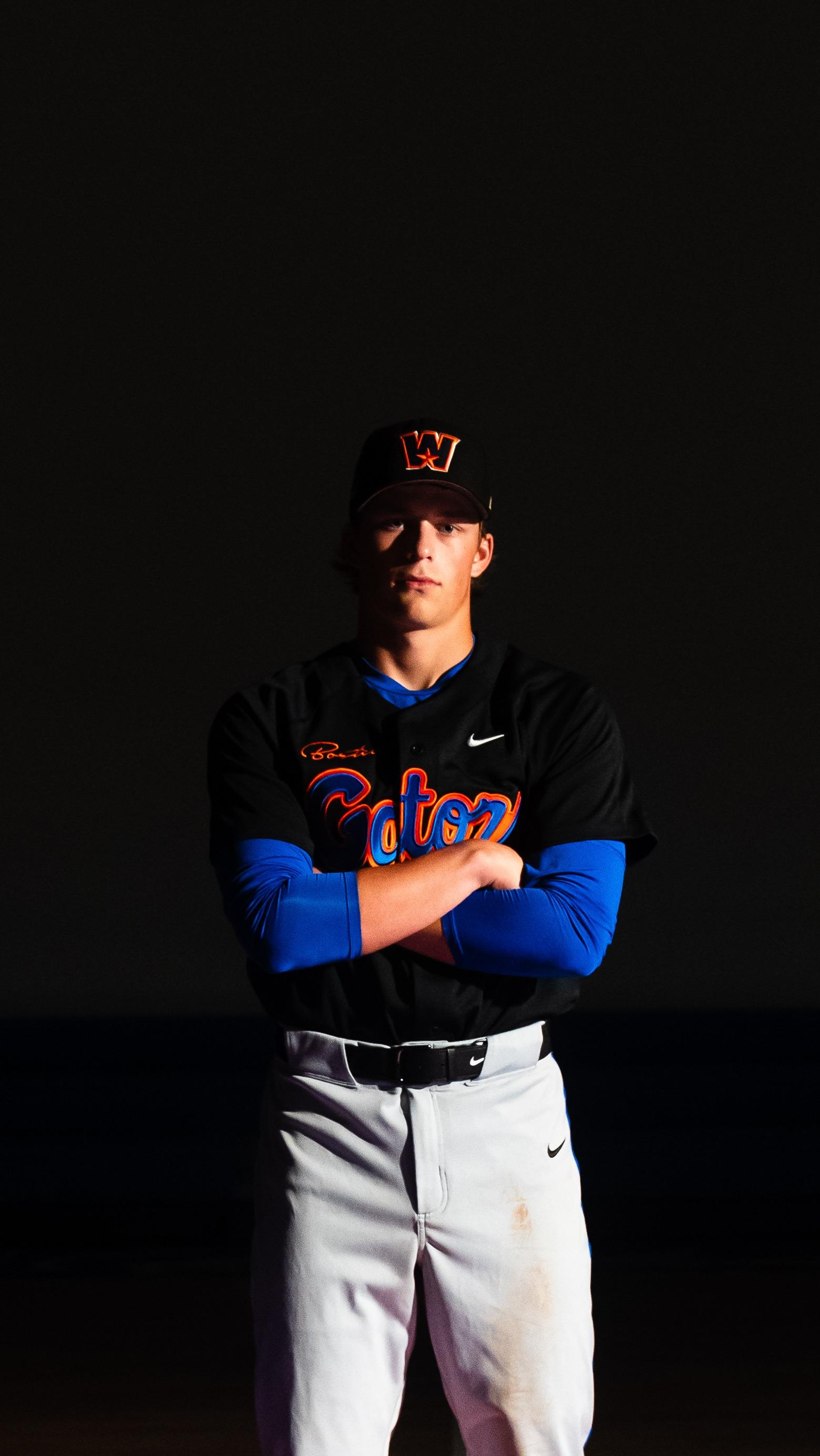 Gators Arms Crossed Blue Sleeves