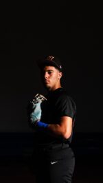 Gators Rawlings Teal Glove